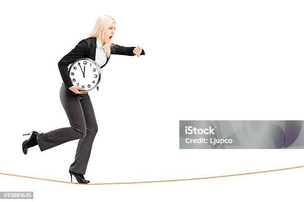 Young Businesswoman Running Late Stock Photo - Download Image Now - Businesswoman, Cut Out, One Woman Only