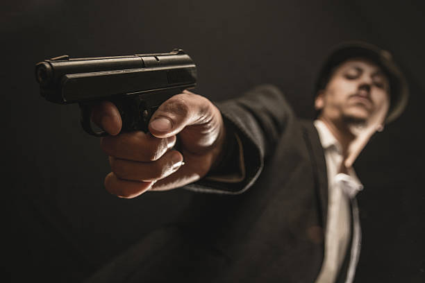 istock keeps a weapon the gangster 493882566