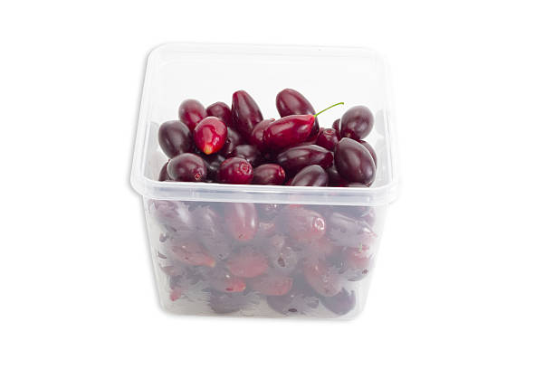 istock Berries of cornus in tray on a light background 493883230
