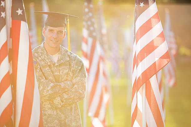istock American Soldier with graduation hat 493883267