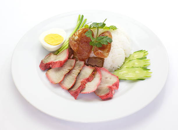 istock red pork with steamed rice and boil egg 493883493
