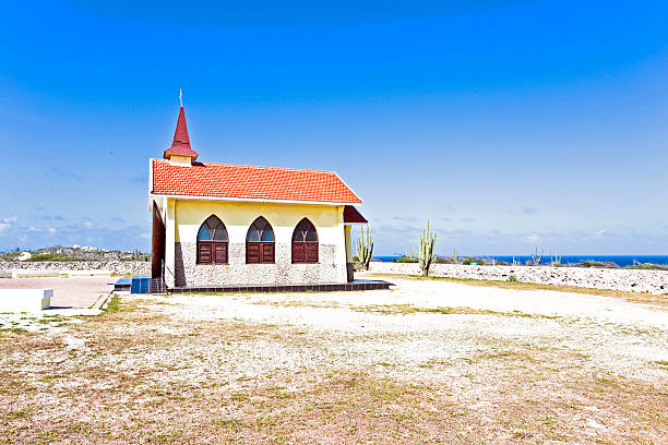 istock Alto Vista Chapel isolated on Aruba's north shore 493884033