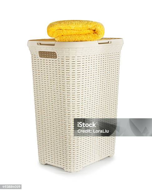 Terry Towels In A Laundry Basket Isolated On White Background Stock Photo - Download Image Now