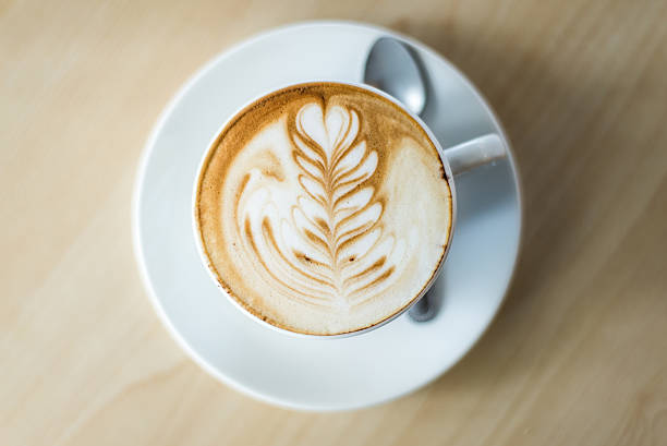 istock cup of coffee with spoon on top view 493884445