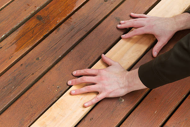 Replacing Cedars Boards on Deck stock photo