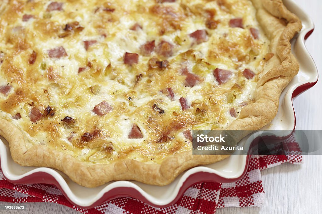 quiche lorraine quiche lorraine - pie with cheese, ham and leek Creme Caramel Stock Photo