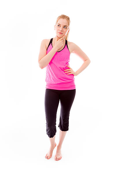 istock Young woman thinking with her hand on chin 493886747