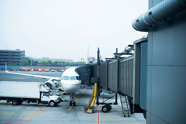 istock Parking car and airplane runway 493886957