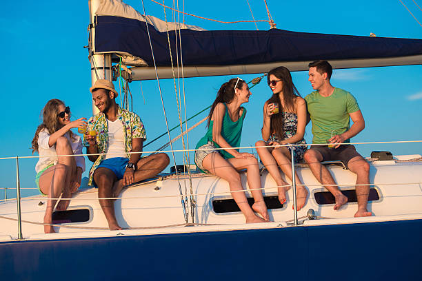 istock Friends spend  weekend on a yacht. 493888396