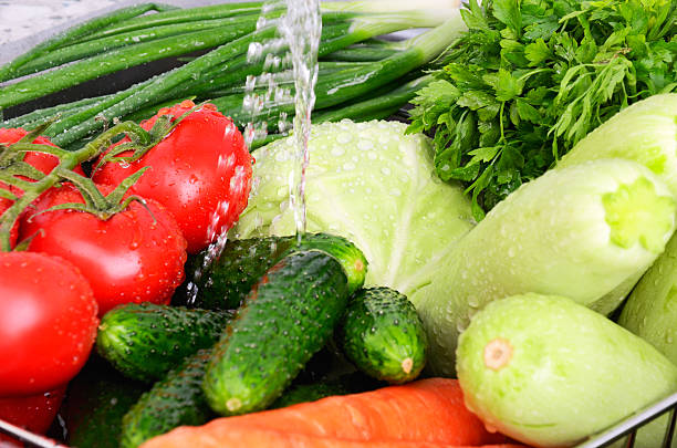 istock vegetables under running water horizontal closeup 0729 493888723