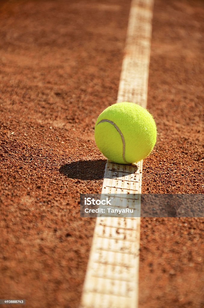 tennis ball is on the markup vertical 0159 tennis ball is on the markup vertical.  low angle view Courthouse Stock Photo