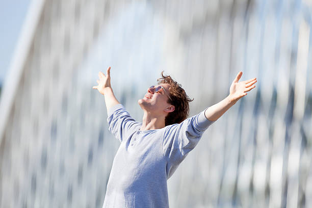istock Excited Young Man Stretching out his Arm in Emotion 493889128