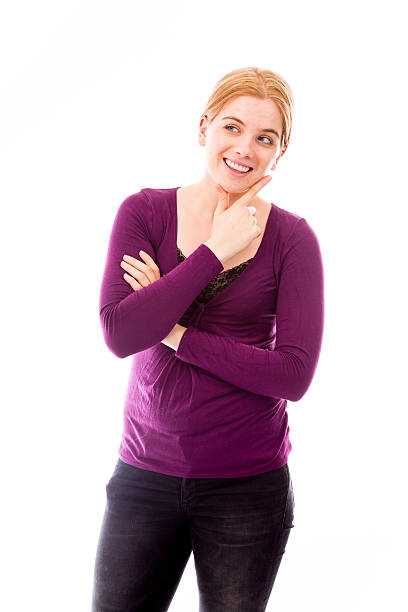 istock Young woman thinking with her hand on chin 493889315