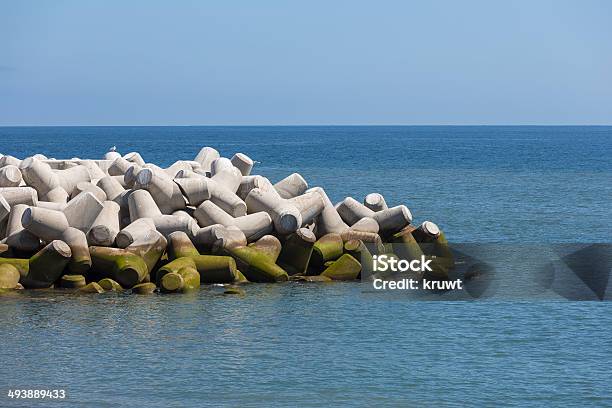 Breakwater Of Tetrapods At The Atlantic Coast Of Madeira Portugal Stock Photo - Download Image Now