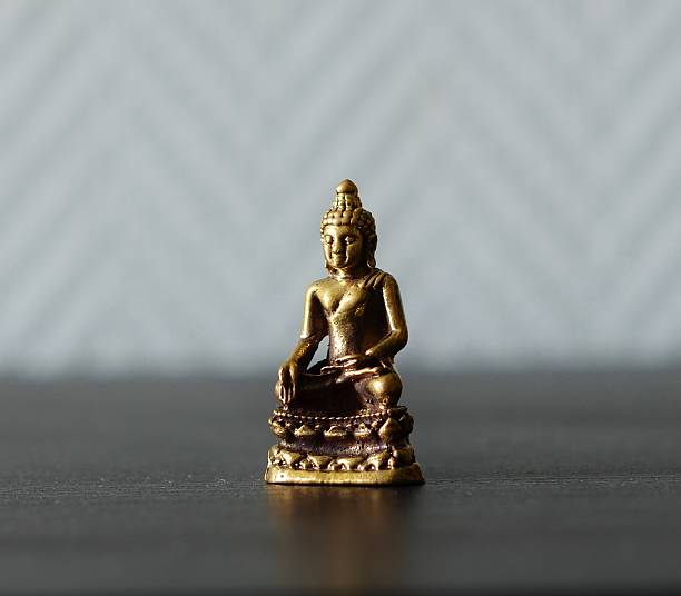 istock Bronze statue of a Buddha 493889814