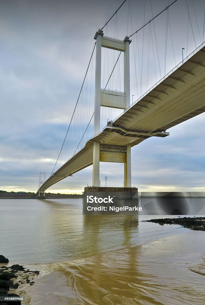 Severn Bridge M48 UK First Severn Suspension Bridge spanning the River Severn, England and Wales, in UK. Viewed from Beachley, Gloucestershire. Openned in 1966. Severn Bridge Stock Photo