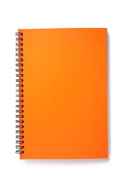 Blank orange Notebook Blank orange Notebook Isolated on white background. workbook stock pictures, royalty-free photos & images