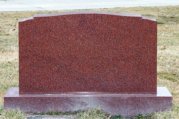 istock Headstone in a cemetery with no markings. 493890626