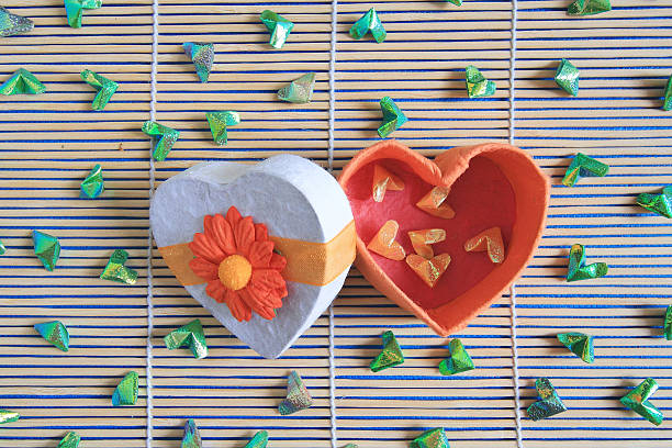 istock Heart shaped Valentines Day gift box on wood background 493904186