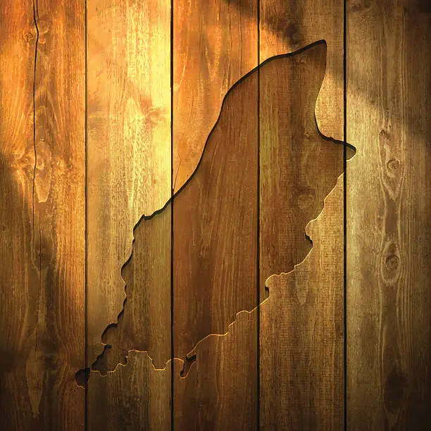 Vector illustration of Isle of Man Map on lit Wooden Background