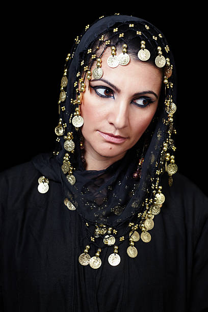 istock Beautiful middle eastern muslim woman lost in thoughts 493904386