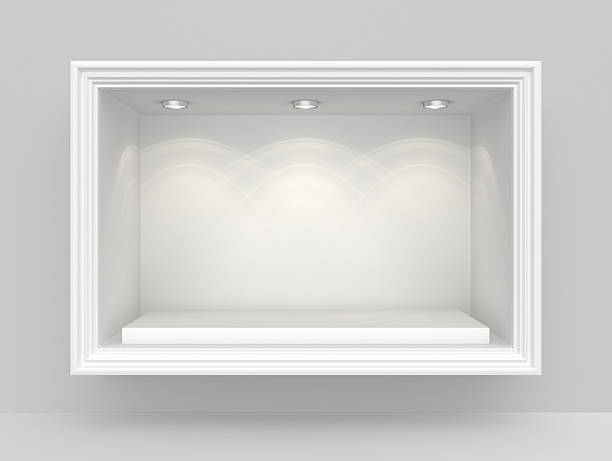 istock White wall with niche and empty pedestal for exhibition 493905658
