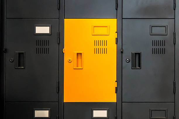 istock Yellow Locker amongst Black Ones 493905736