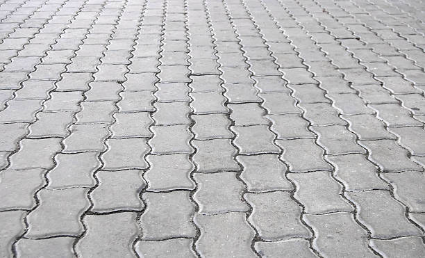 istock Urban road is paved with blocks of stone 493907148
