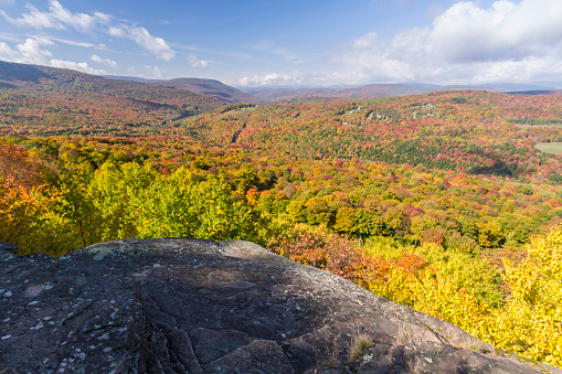 Peak Autumn Colors on Brush Ridge and Fleischmann Mountain seen from a ledge on Monka Hill in the Catskills Mountain of upstate New York.