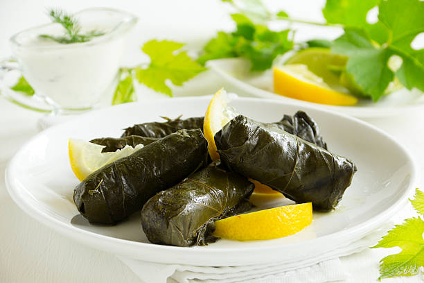 istock dolma, stuffed grape leaves, turkish and greek cuisine 493915327