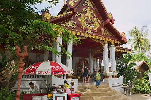 Koh Samui, Thailand - April 07, 2012: Unidentified people visit Wat Khunaram temple in Koh Samui, Thailand.