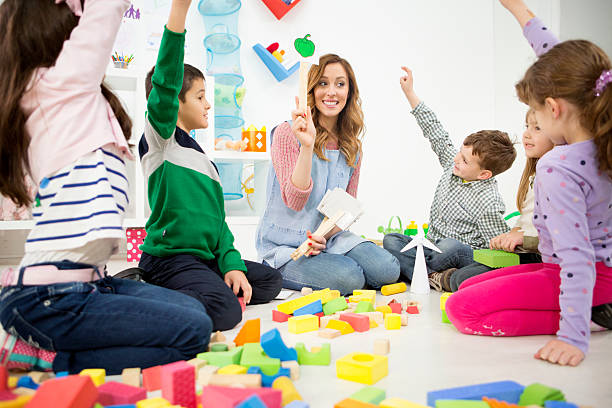 istock Children Guessing Vegetables in a kindergarden. 493916283