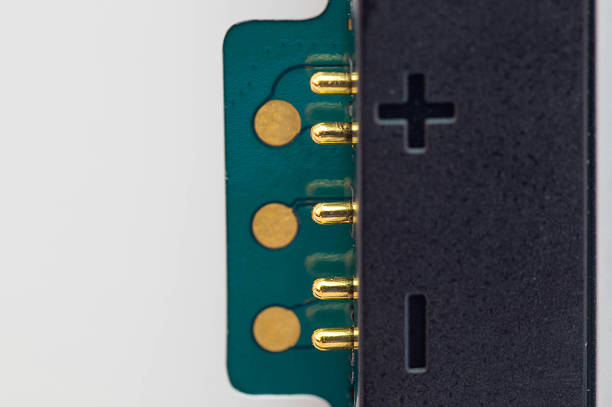istock Macro shot of a smartphone battery connector pins 493917236