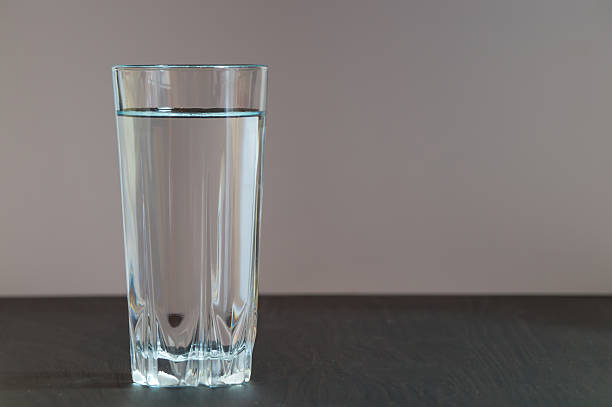 istock Tall glass with clean water in it 493917554