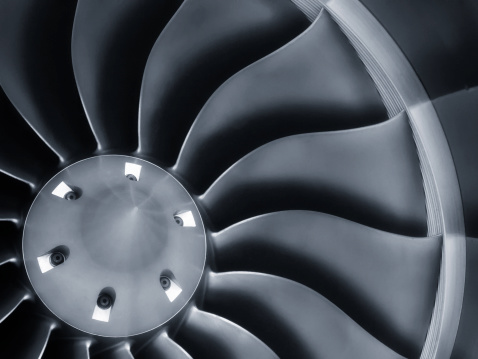 This close up image of a business aircraft jet engine inlet fan makes a great business travel or aerospace background.