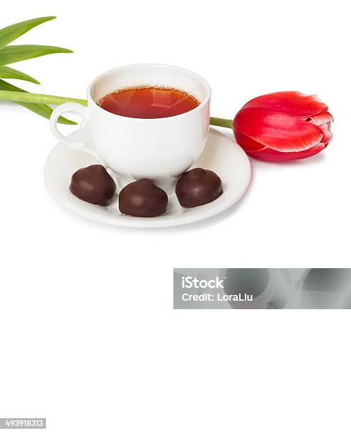 Beautiful Red Tulip And Cup Of Hot Tea With Chocolate Stock Photo - Download Image Now