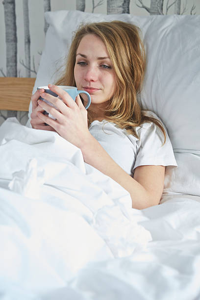 istock Girl sick in bed 493919003