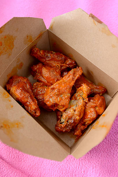 istock spicy buffalo wings and drumsticks 493920243
