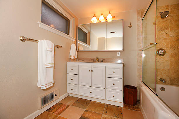 istock Luxury classic basement bathroom with white and beige 493920995