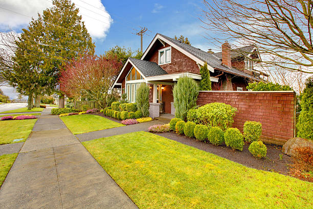 istock Spring exterior house with brown siding 493921261