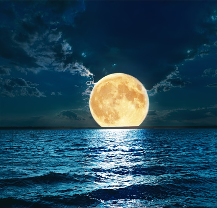 super moon over water