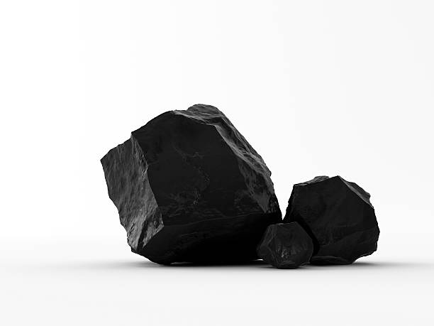 istock Handful of granular coal on white background 493929472