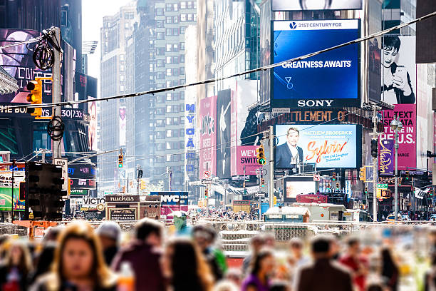 istock People and traffic in Times Square 493933472