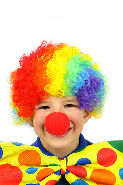 istock Happy Child Clown on White Background 493933764