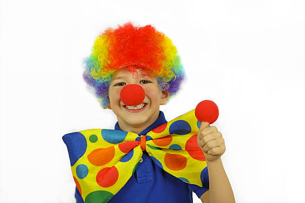 istock Funny Young Clown in Colorful Costume on White Background 493933784
