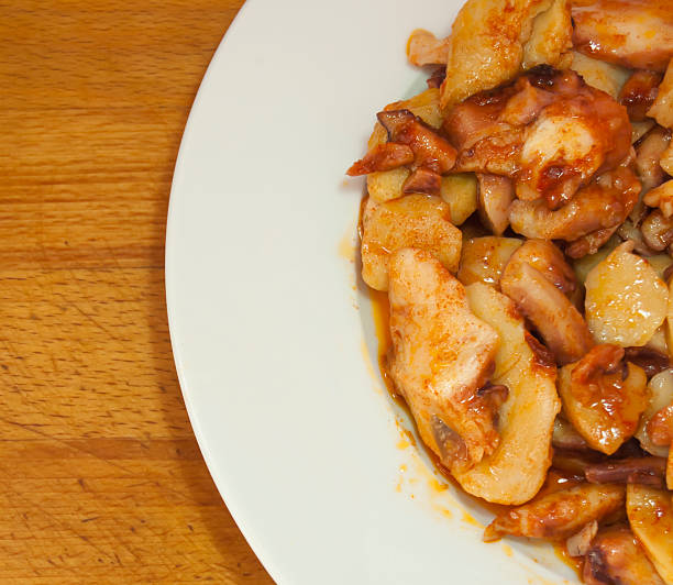 istock Octopus with paprika on a white plate 493934280