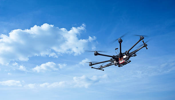 Octocopter, copter, drone Copter flight against the blue sky. RC aerial drone. unmanned aerial vehicle stock pictures, royalty-free photos & images