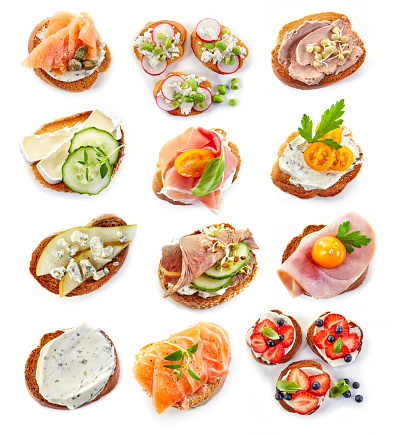 various bruschettas isolated on white background, top view