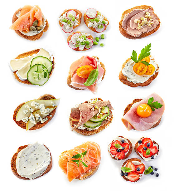various bruschettas various bruschettas isolated on white background, top view canape stock pictures, royalty-free photos & images