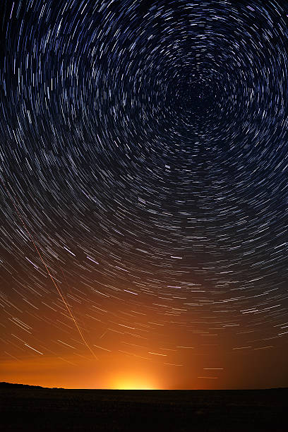 istock Star trail in the night sky 493936786